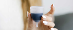 A photo of the June Cup holding liquid as it should -- if your cup leaks, there are plenty of simple reasons why you menstrual cup is leaking. 